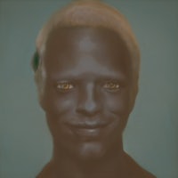 a portrait of a man with blond hair and green eyes