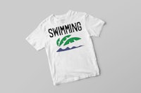 a white t - shirt with the word swimming on it
