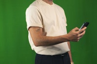 a man holding a cell phone