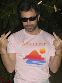 a man wearing a pink shirt
